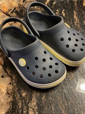 CROCS Kids Navy Slip-On Clogs with Yellow Accent